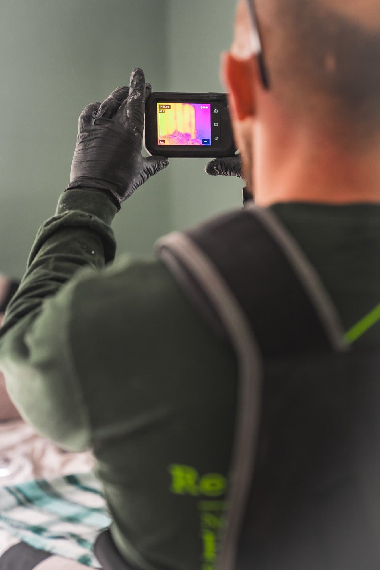 Thermal scan of interior wall checking for insulation gaps